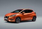 Nissan Micra arancione tre quarti anteriore