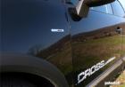 Prova Renault Scénic XMod Cross 1.5 dCi 110 CV tre quarti anteriore dettaglio badge laterale